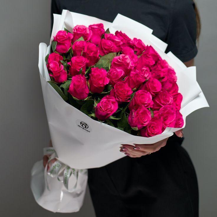 Professional floral arrangement in modern corporate setting